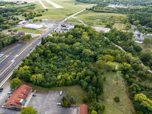 a view of a garden with an outdoor space