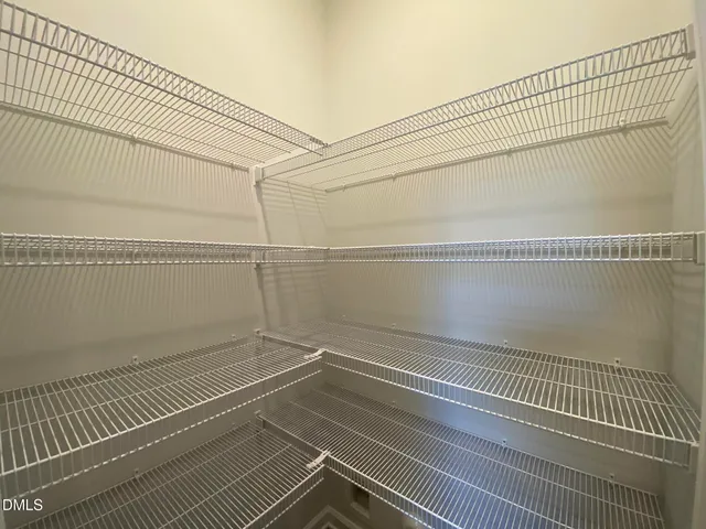 a view of a room with racks on the wall