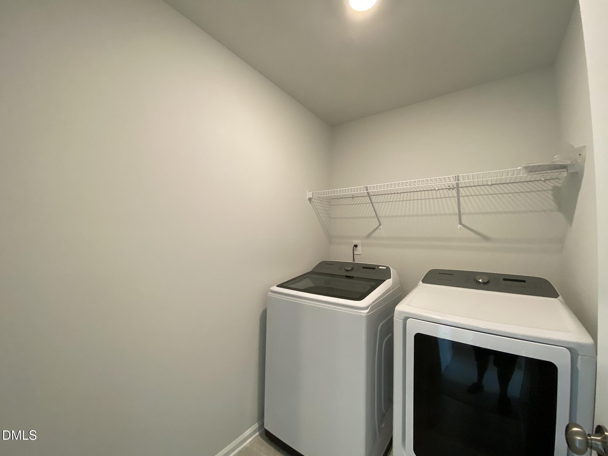 218 Loxton Street Fuquay-Varina, NC 27526 - Photo 34 of 37 a utility room with dryer and washer