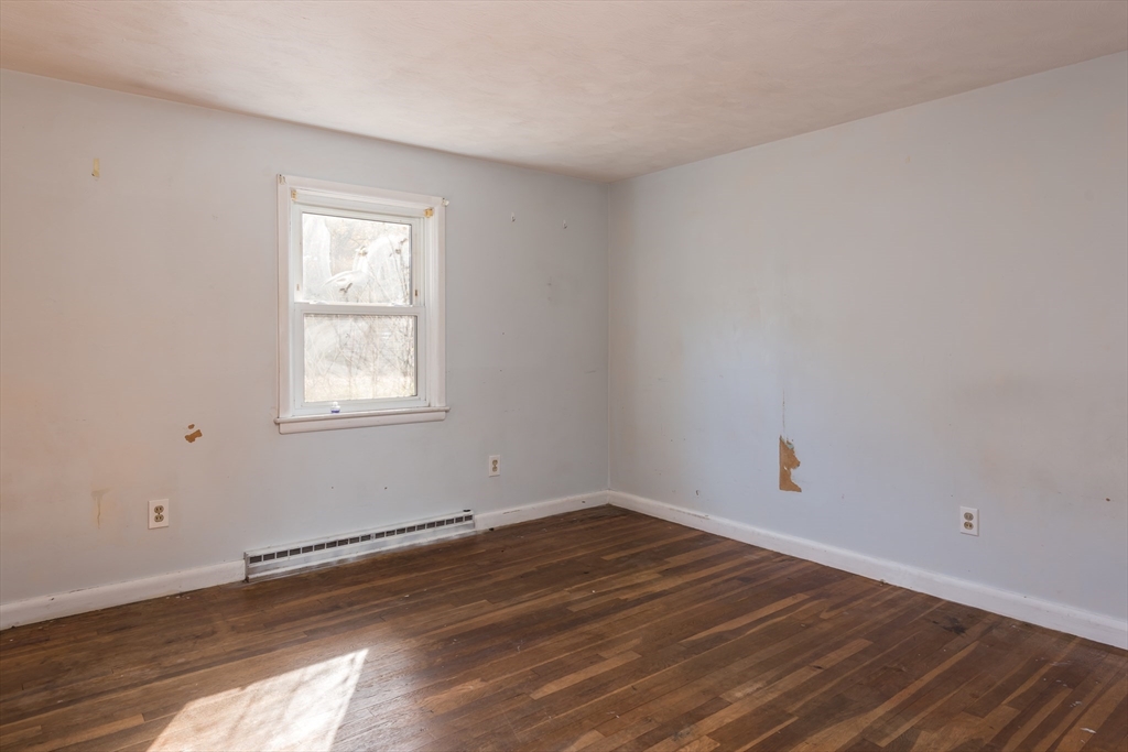 25 Lawrence Road Halifax, MA 02338 - Photo 12 of 19 a view of a room that has wooden floor and window