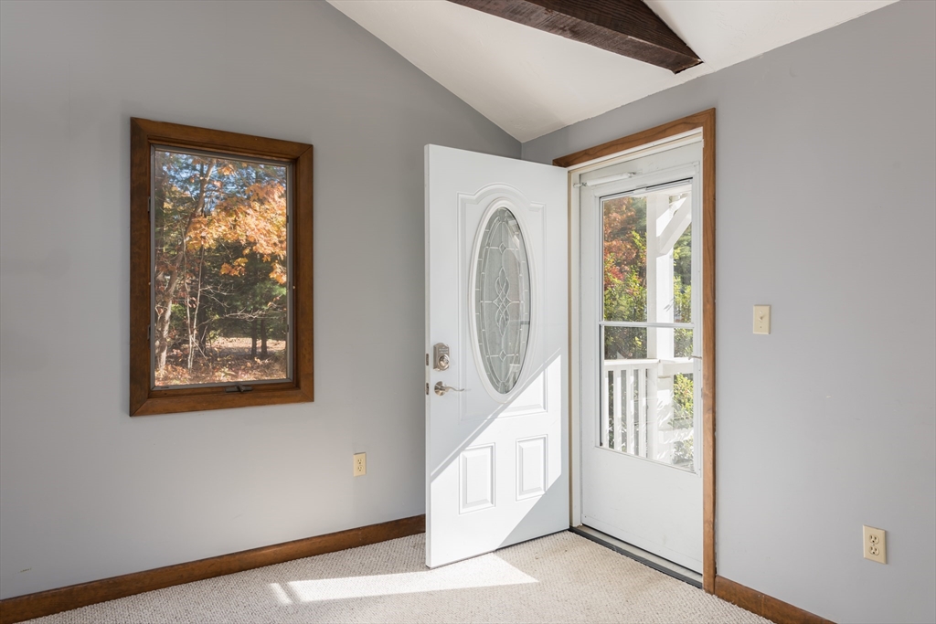25 Lawrence Road Halifax, MA 02338 - Photo 19 of 19 a view of a hallway with windows and entryway