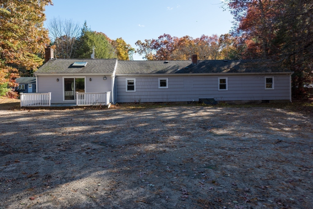 25 Lawrence Road Halifax, MA 02338 - Photo 20 of 22 a view of a house with a yard