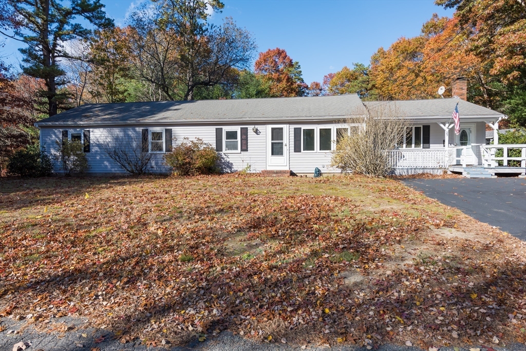 25 Lawrence Road Halifax, MA 02338 - Photo 3 of 22 a front view of a house with a garden