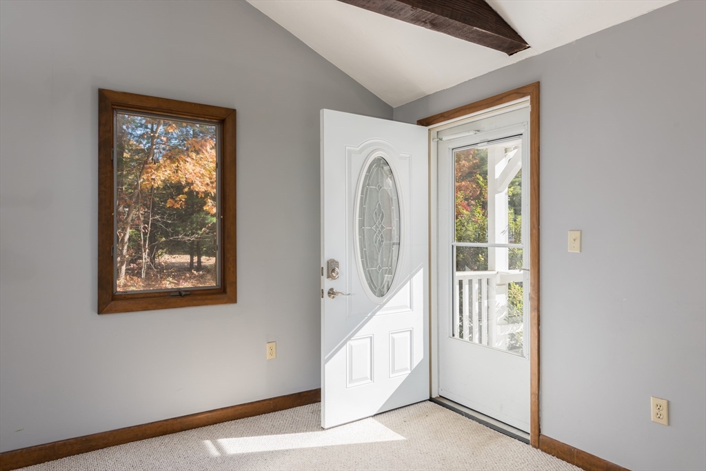 25 Lawrence Road Halifax, MA 02338 - Photo 4 of 19 a view of a hallway with windows and entryway