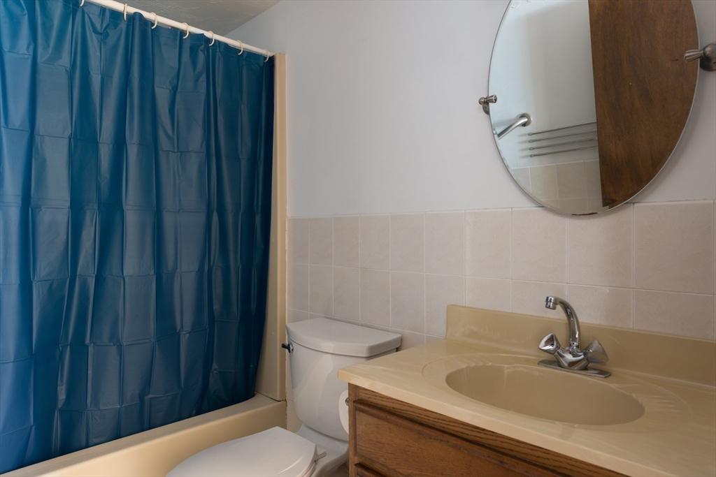 25 Lawrence Road Halifax, MA 02338 - Photo 9 of 22 a bathroom with a sink and toilet