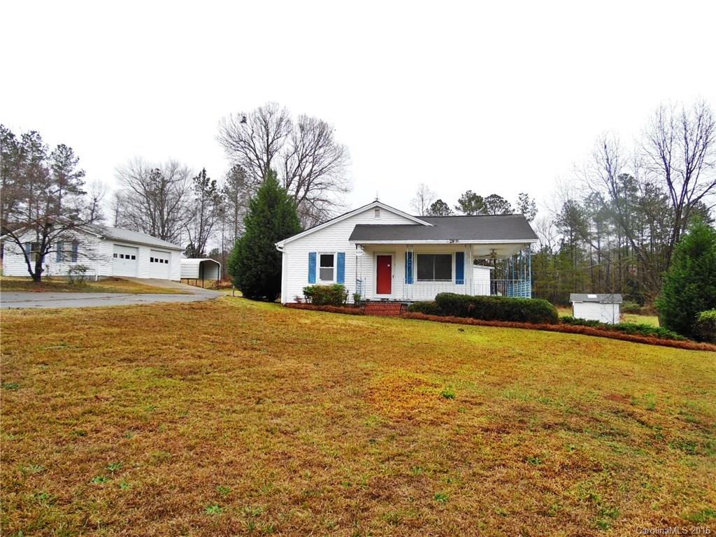 2106 Pinckney Road Chester, SC 29706 - Photo 1 of 18 a front view of a house with swimming pool