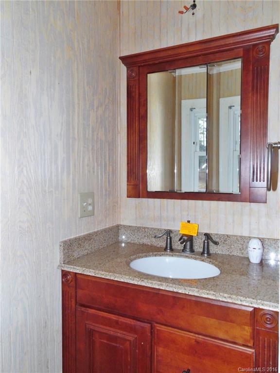 2106 Pinckney Road Chester, SC 29706 - Photo 13 of 18 a bathroom with a sink and a mirror
