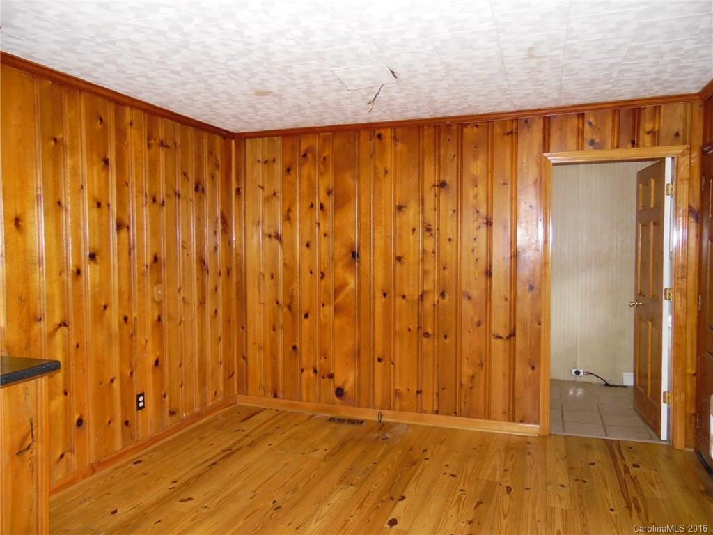 2106 Pinckney Road Chester, SC 29706 - Photo 4 of 18 a view of a room with wooden floor and a wooden door