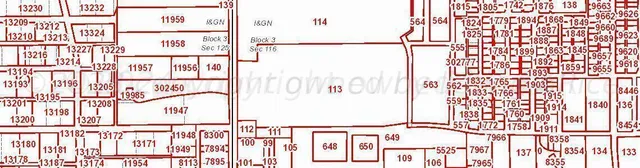 a picture of a black and white wall with a large window