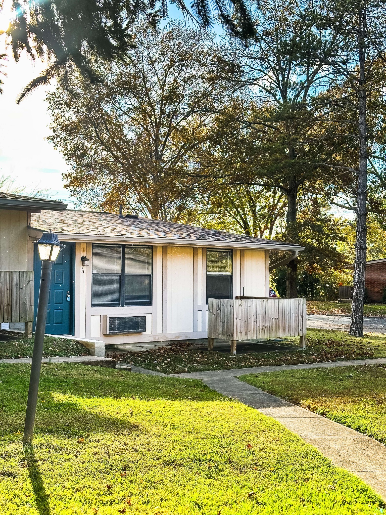 2421 Madison Street, Unit 13 Clarksville, TN 37043 - Photo 2 of 10 a view of a house with swimming pool and a yard