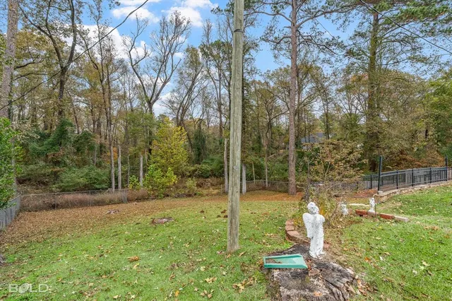 a front view of a house with garden and porch