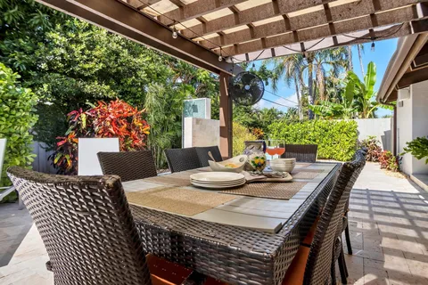 a view of a patio with furniture
