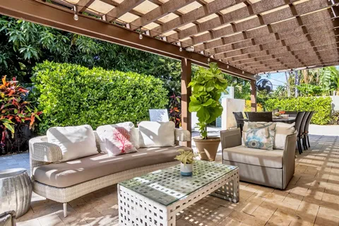 a outdoor living space with furniture and garden view
