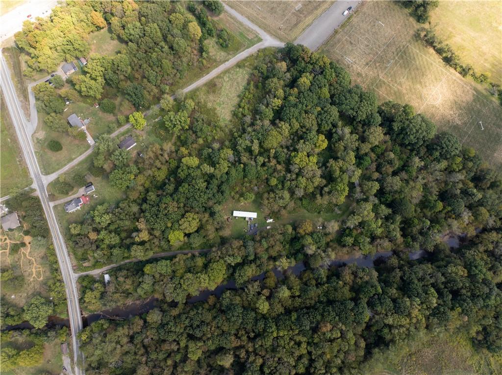 1409 Highway 989 Rochester, PA 15074 - Photo 1 of 17 a view of a yard