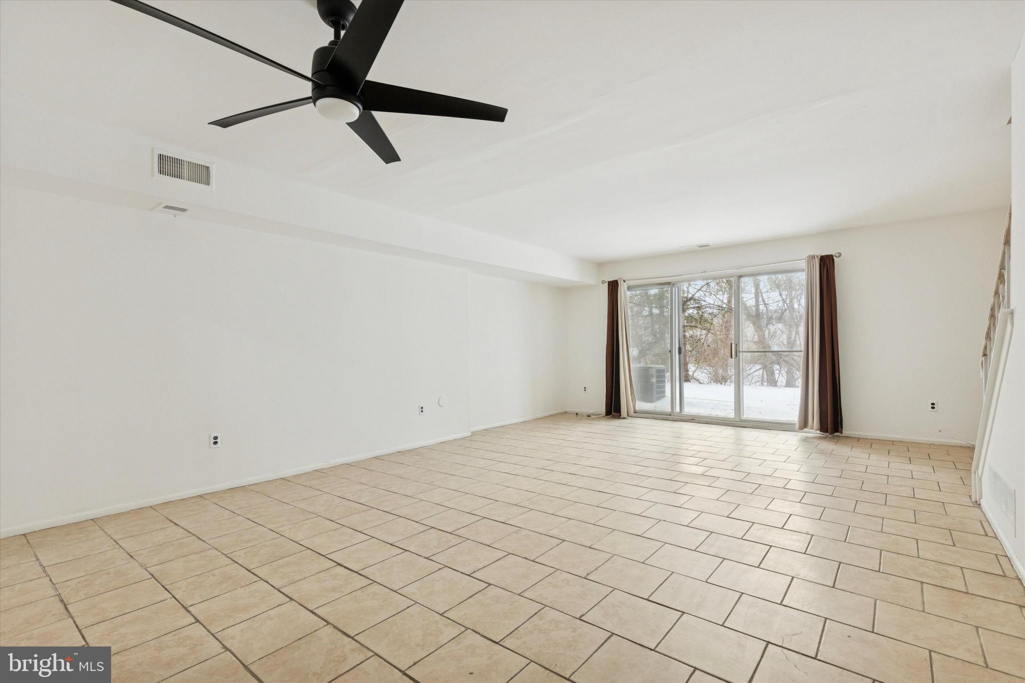 21 Cavendish Drive Ambler, PA 19002 - Photo 7 of 29 a view of an empty room and window