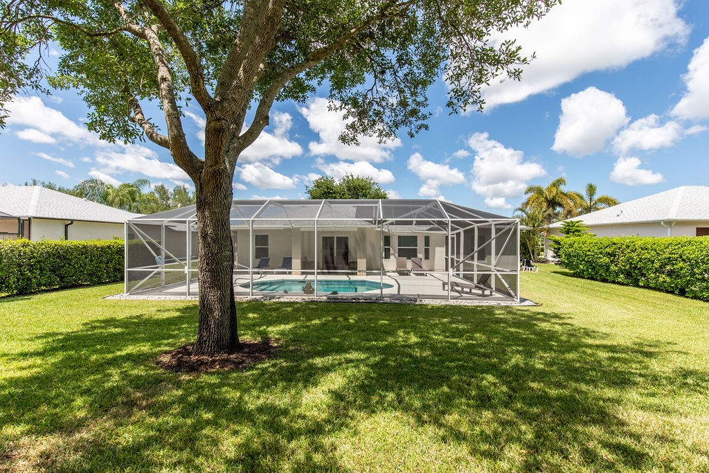 3673 2nd Place Southwest Vero Beach, FL 32968 - Photo 33 of 33 a front view of house with yard and patio