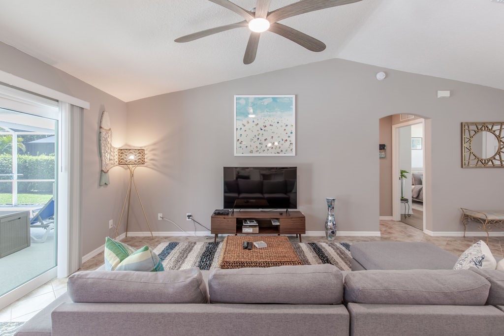 3673 2nd Place Southwest Vero Beach, FL 32968 - Photo 5 of 33 a living room with furniture and a flat screen tv