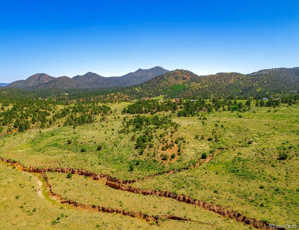 525 Brush Hollow Road Westcliffe, CO 81252 - Photo 9 of 21 a view of mountain with lake in the background