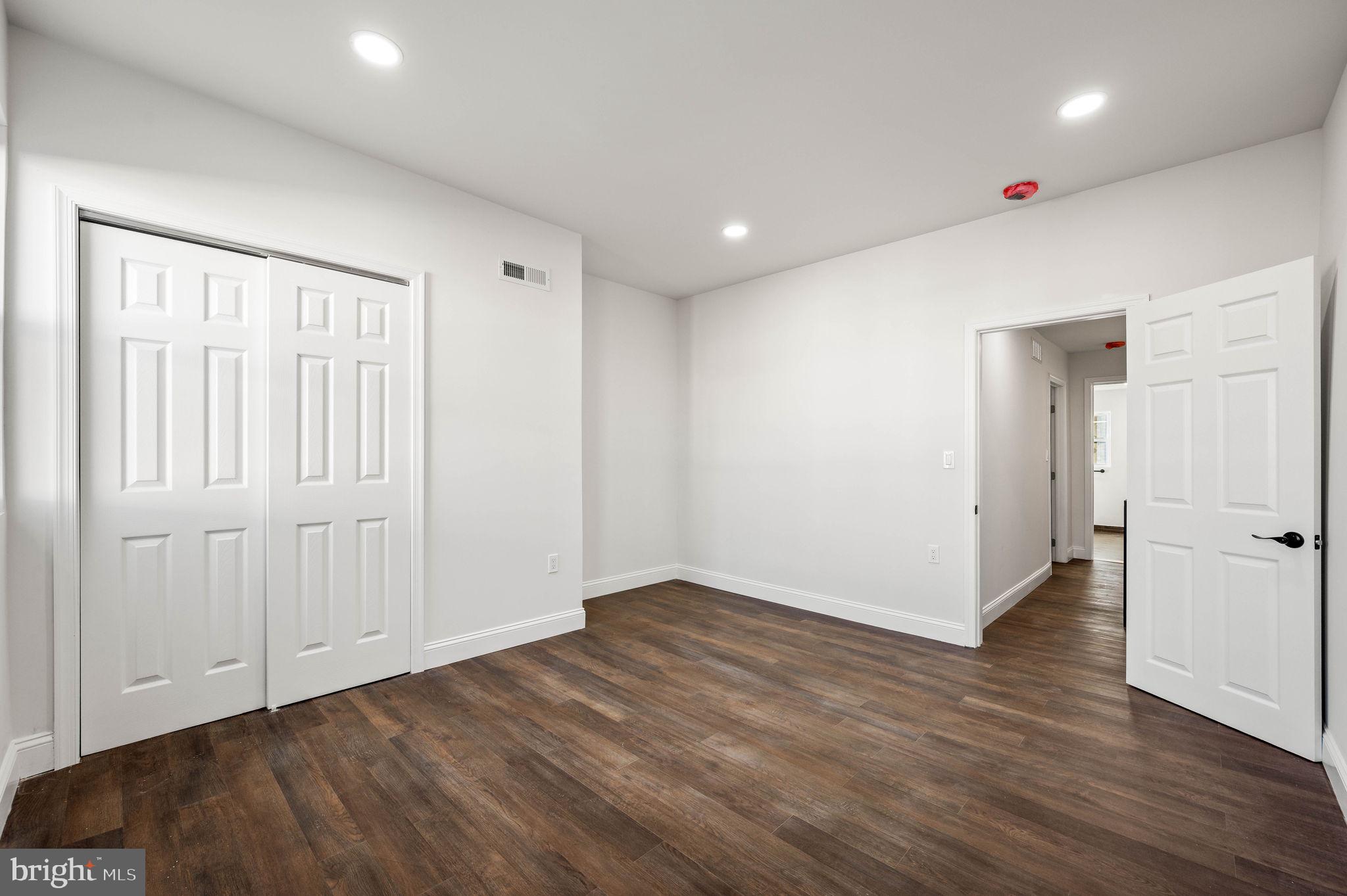 1852 East Lippincott Street Philadelphia, PA 19134 - Photo 14 of 25 a view of an empty room with wooden floor