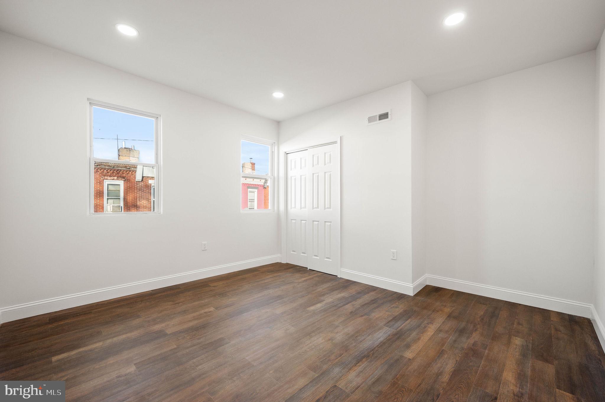 1852 East Lippincott Street Philadelphia, PA 19134 - Photo 15 of 25 a view of an empty room with wooden floor