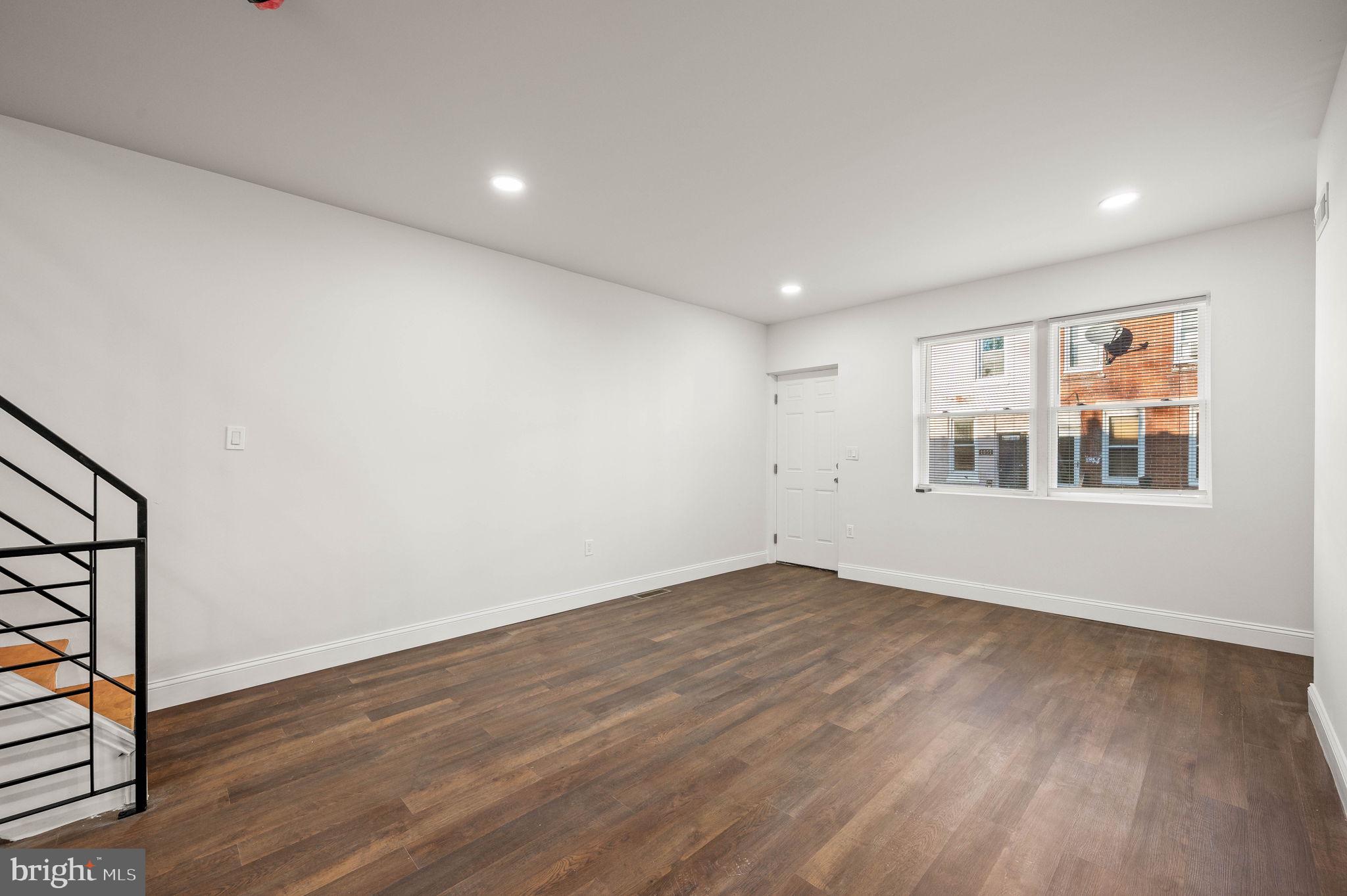 1852 East Lippincott Street Philadelphia, PA 19134 - Photo 21 of 25 a view of empty room with wooden floor and fan