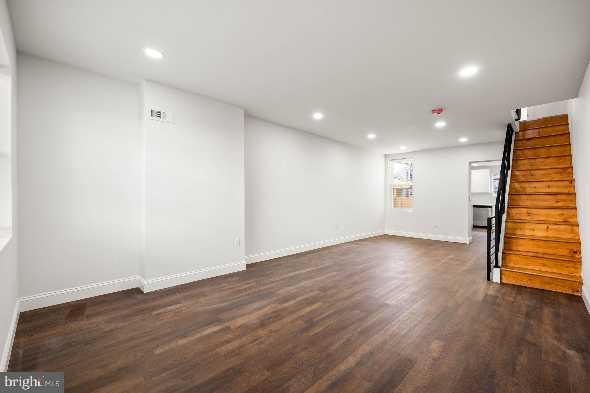 1852 East Lippincott Street Philadelphia, PA 19134 - Photo 24 of 25 wooden floor in an empty room with a window