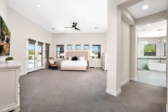 a room with a bed and a view of bedroom