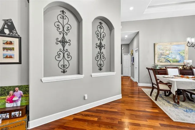 a living room with fireplace furniture and a flat screen tv