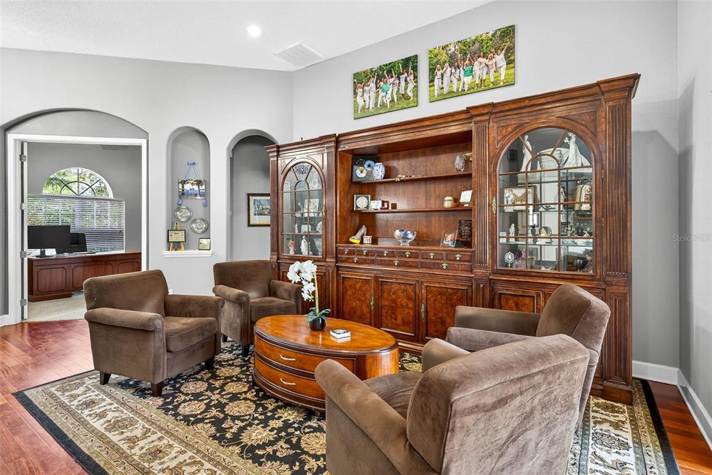 13887 Gavin Road Dover, FL 33527 - Photo 21 of 74 a living room with furniture a rug and a window