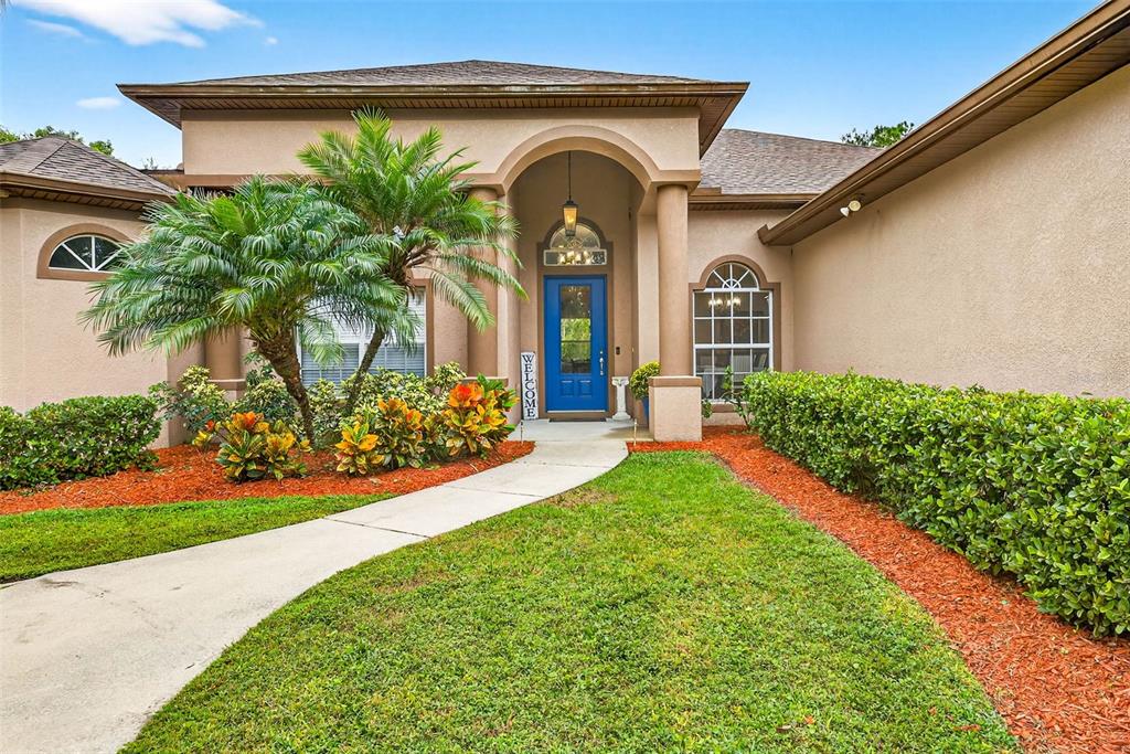 13887 Gavin Road Dover, FL 33527 - Photo 4 of 74 a front view of a house with a yard