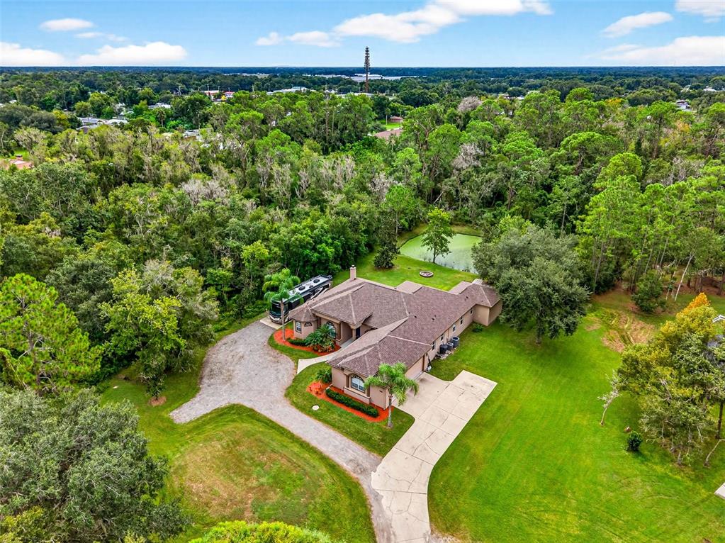 13887 Gavin Road Dover, FL 33527 - Photo 70 of 74 an aerial view of a house with garden
