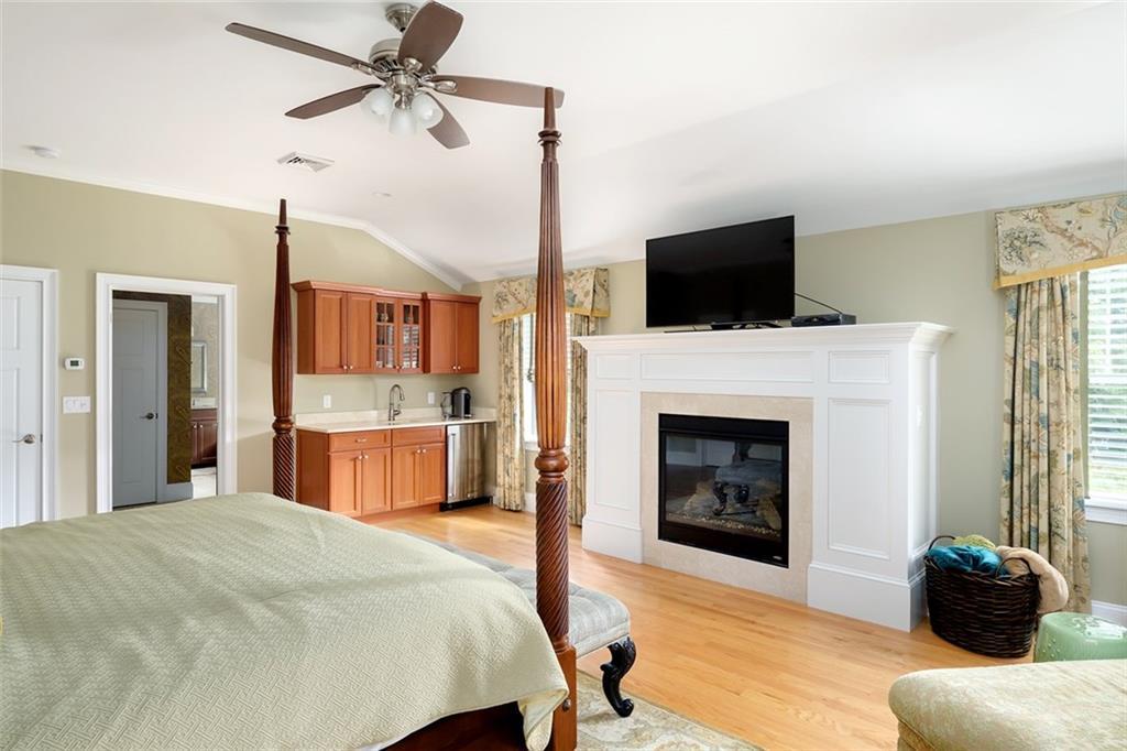 131 Shore Road Cape Neddick, ME 03902 - Photo 21 of 35 A gas fireplace and wet bar in the...