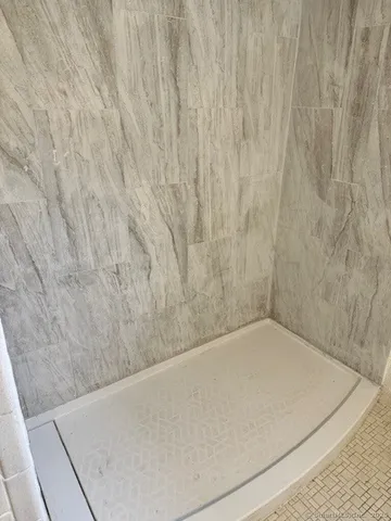 a bathroom with a bathtub