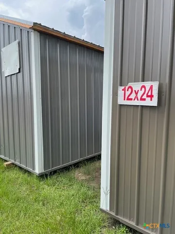 a room with a bed and a window