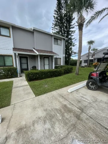 a small garden in the corners of a house