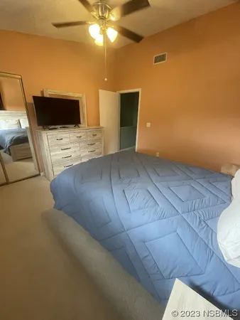 a view of a livingroom with furniture