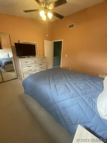 a view of a livingroom with furniture