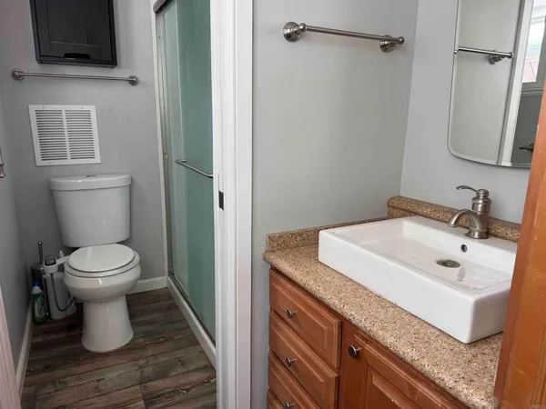 a bathroom with a sink and a toilet