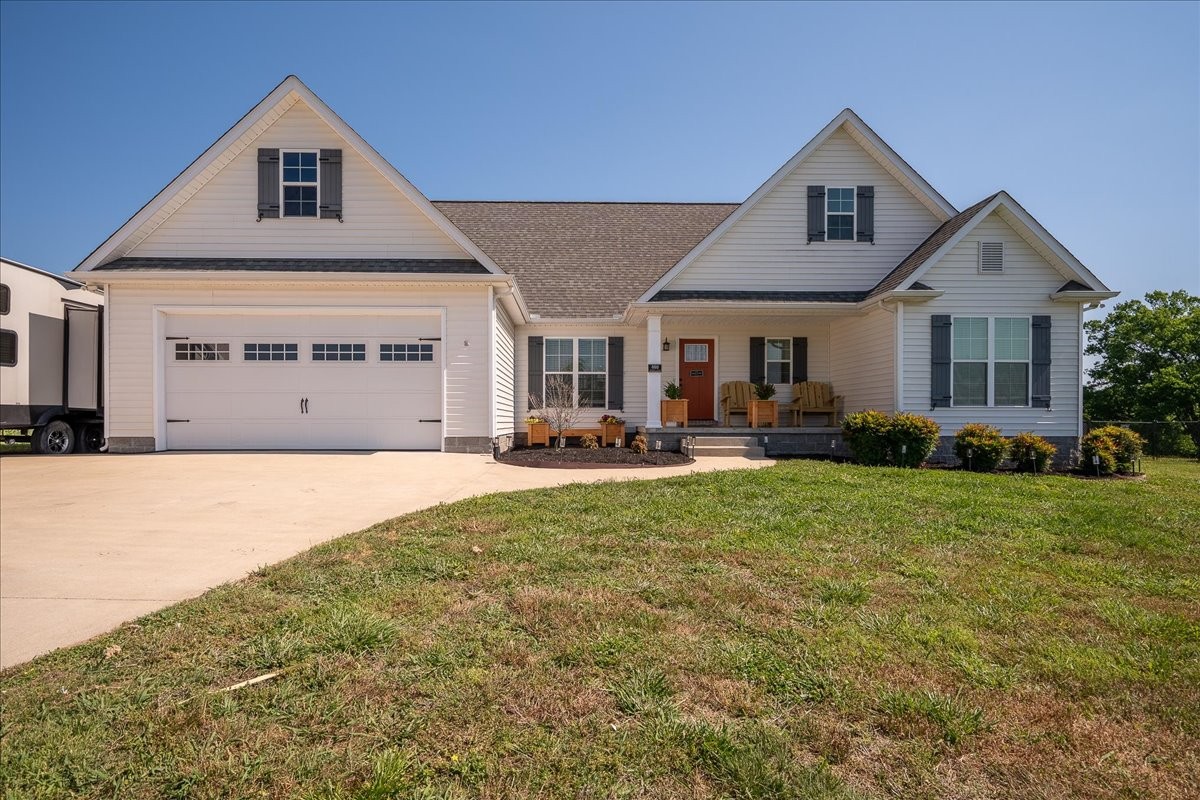 460 Ables Lane Pulaski, TN 38478 - Photo 1 of 23 a front view of a house with garden