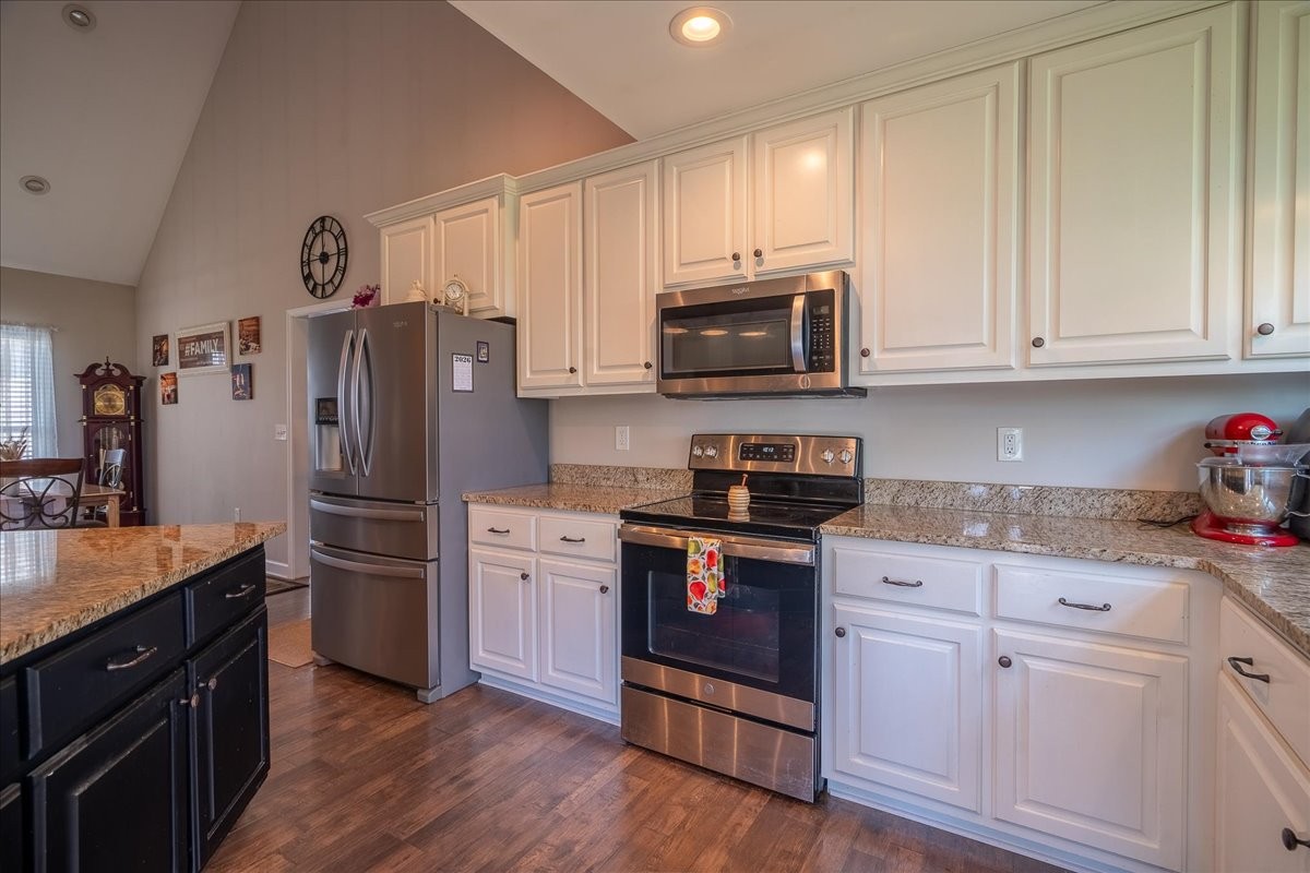 460 Ables Lane Pulaski, TN 38478 - Photo 12 of 23 a kitchen with cabinets stainless steel appliances and a counter space