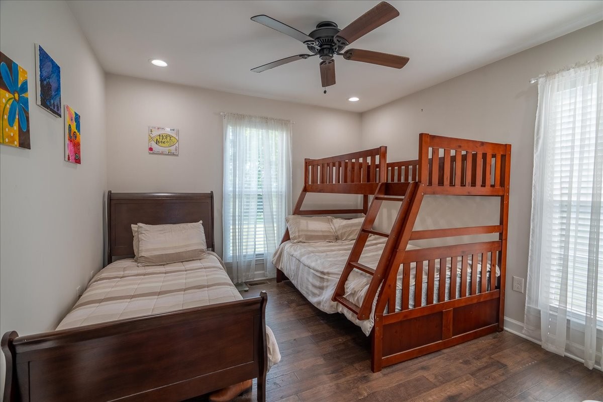 460 Ables Lane Pulaski, TN 38478 - Photo 13 of 23 a bedroom with a bed and a chandelier