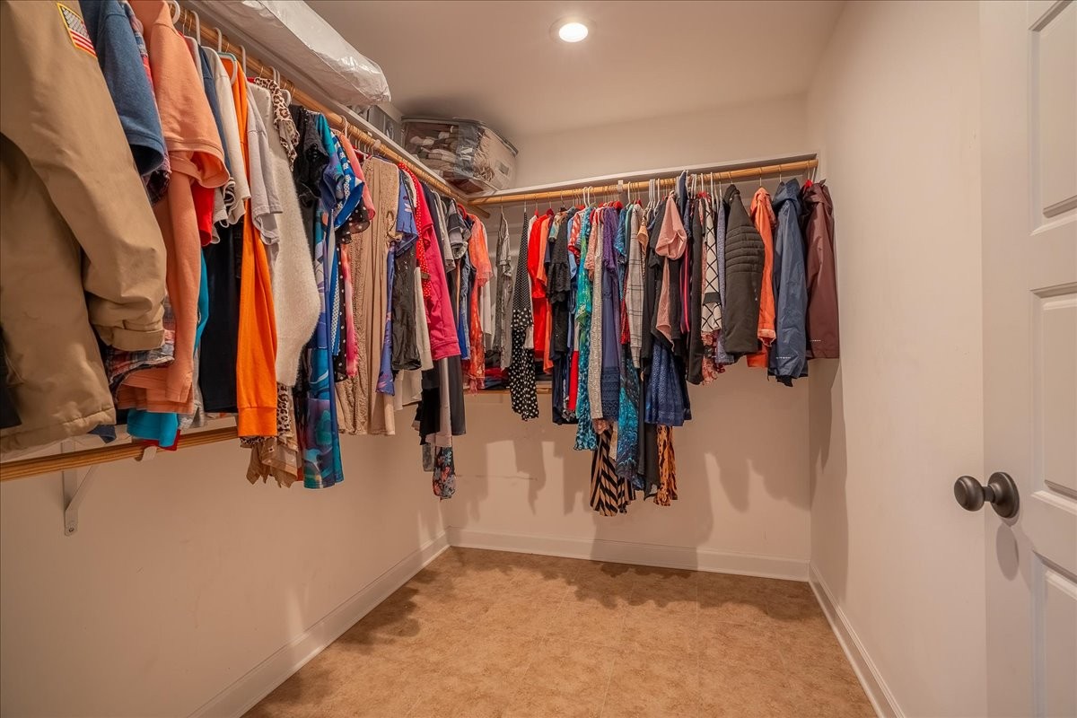 460 Ables Lane Pulaski, TN 38478 - Photo 20 of 23 a view of walk in closet with clothes