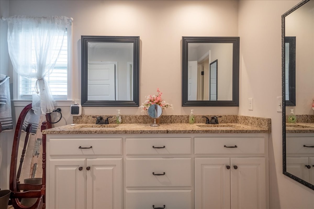 460 Ables Lane Pulaski, TN 38478 - Photo 21 of 23 a bathroom with a granite countertop sink vanity and mirror
