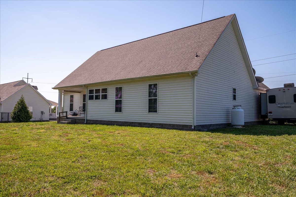 460 Ables Lane Pulaski, TN 38478 - Photo 5 of 23 a view of a house with a yard