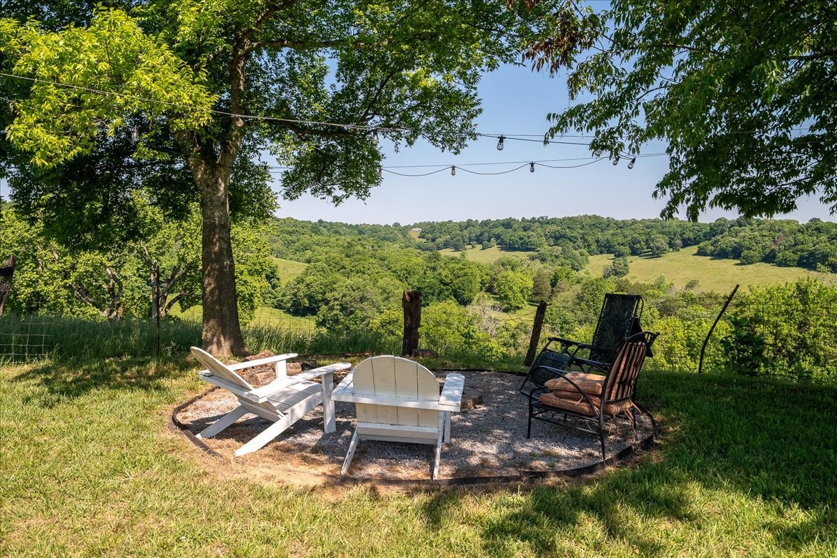460 Ables Lane Pulaski, TN 38478 - Photo 8 of 23 a view of a lake with a patio