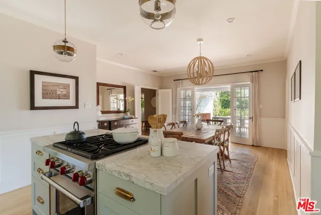 a bathroom with a sink toilet and mirror