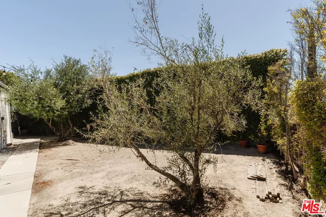 a outdoor living space with furniture and garden view