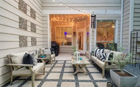 a building outdoor space with patio furniture