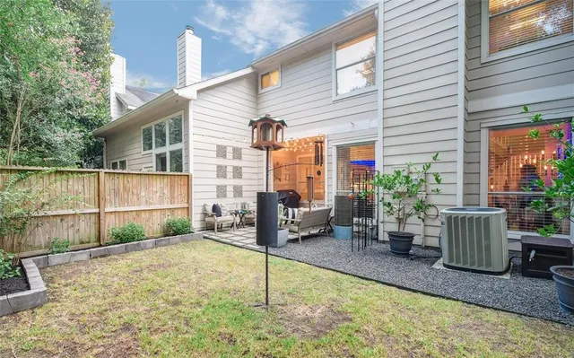 a backyard of a house with seating space