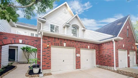 a view of a house with garage